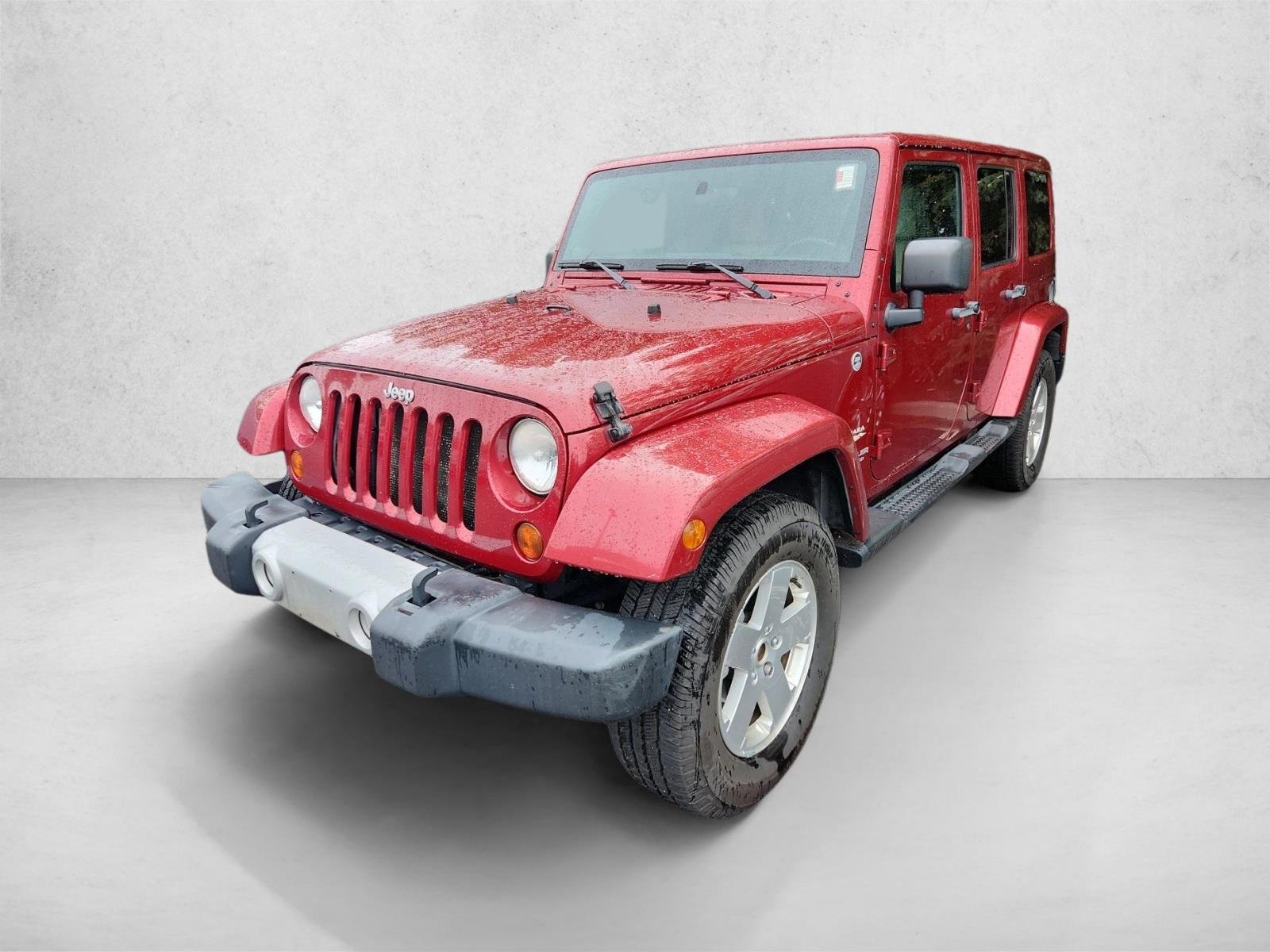 Used 2012 Deep Cherry Red Crystal Pearl Jeep Sahara image 11