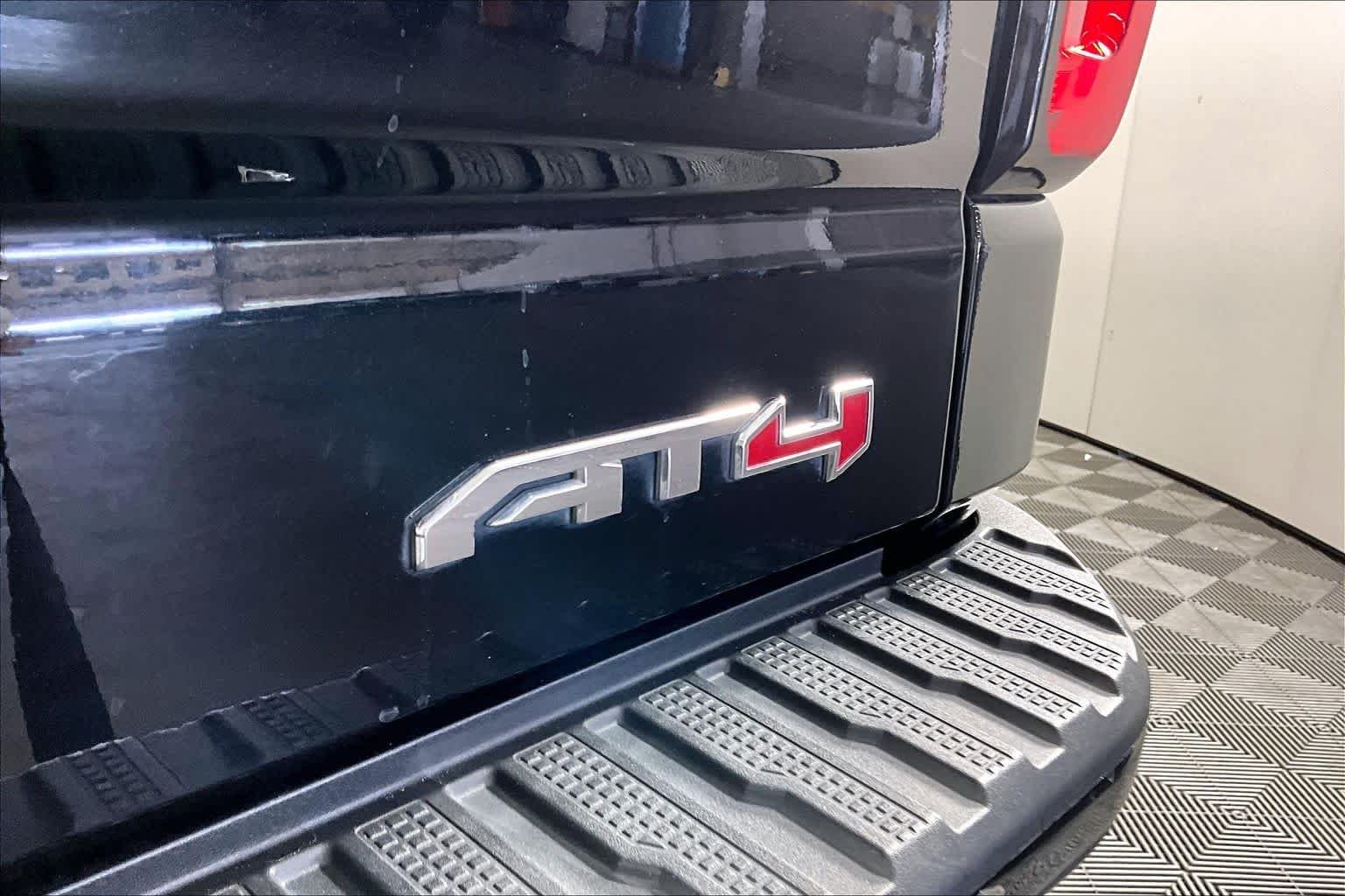 Used 2021 EBONY TWILIGHT METALLIC GMC AT4 image 10