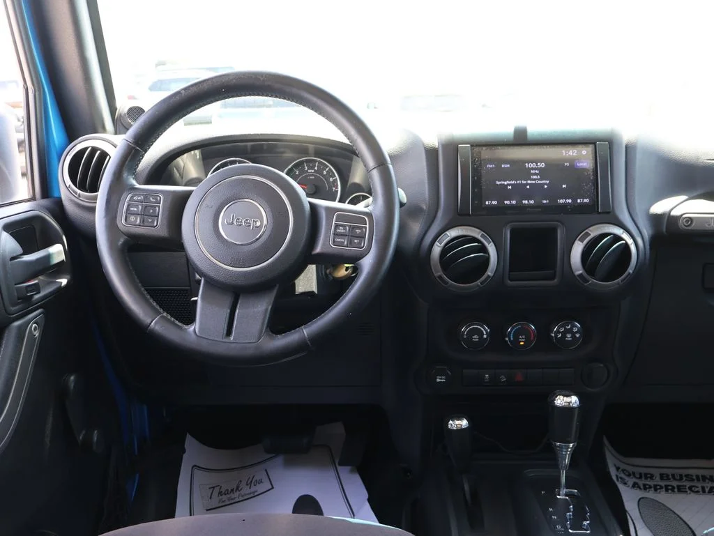 Used 2014 Blue Jeep Unlimited Sport image 17