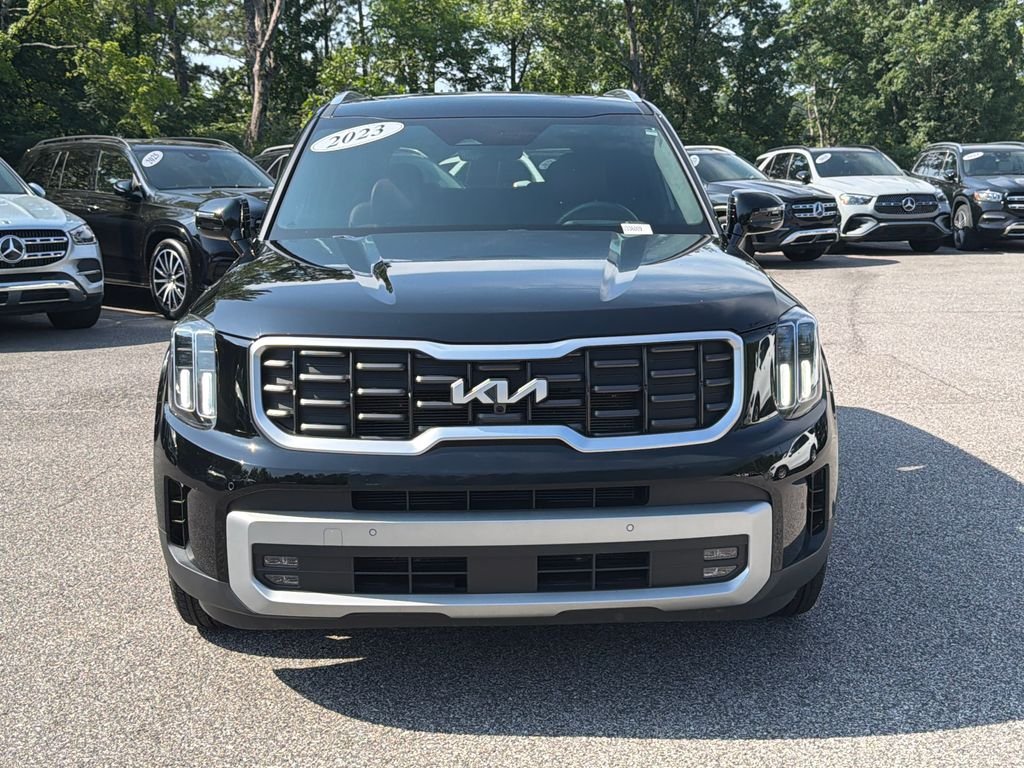 Used 2023 Ebony Black Kia SX-Prestige image 4