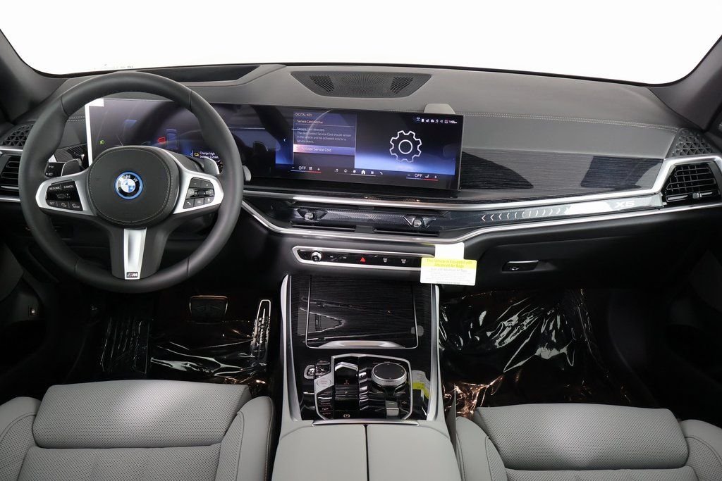 New 2026 Black Sapphire Metallic BMW xDrive50e image 4