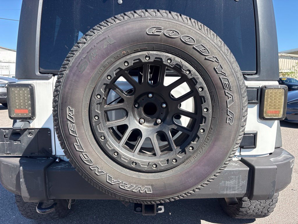 Used 2016 White Jeep Unlimited Sport image 13