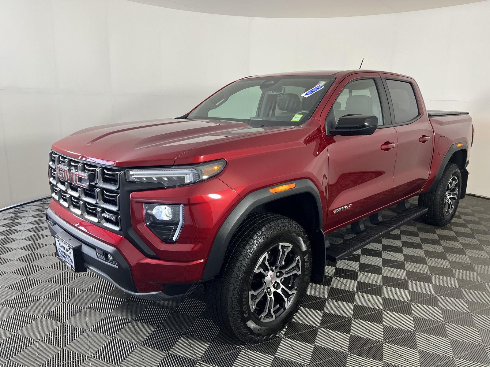 Used 2025 Volcanic Red Tintcoat GMC 4WD AT4 image 22