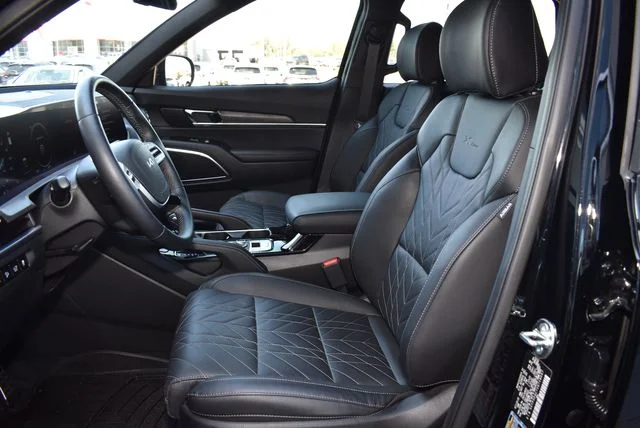 Used 2025 Ebony Black Kia SX X-Line image 12
