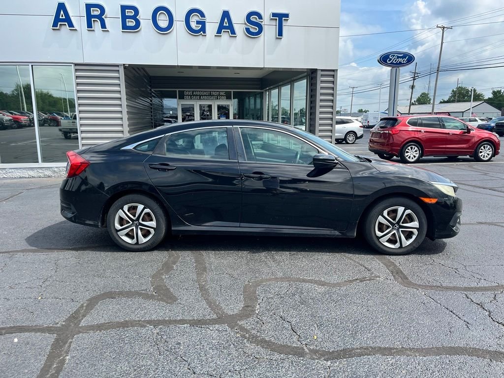 Used 2016 Honda Civic LX with VIN 19XFC2F50GE009508 for sale in Troy, OH