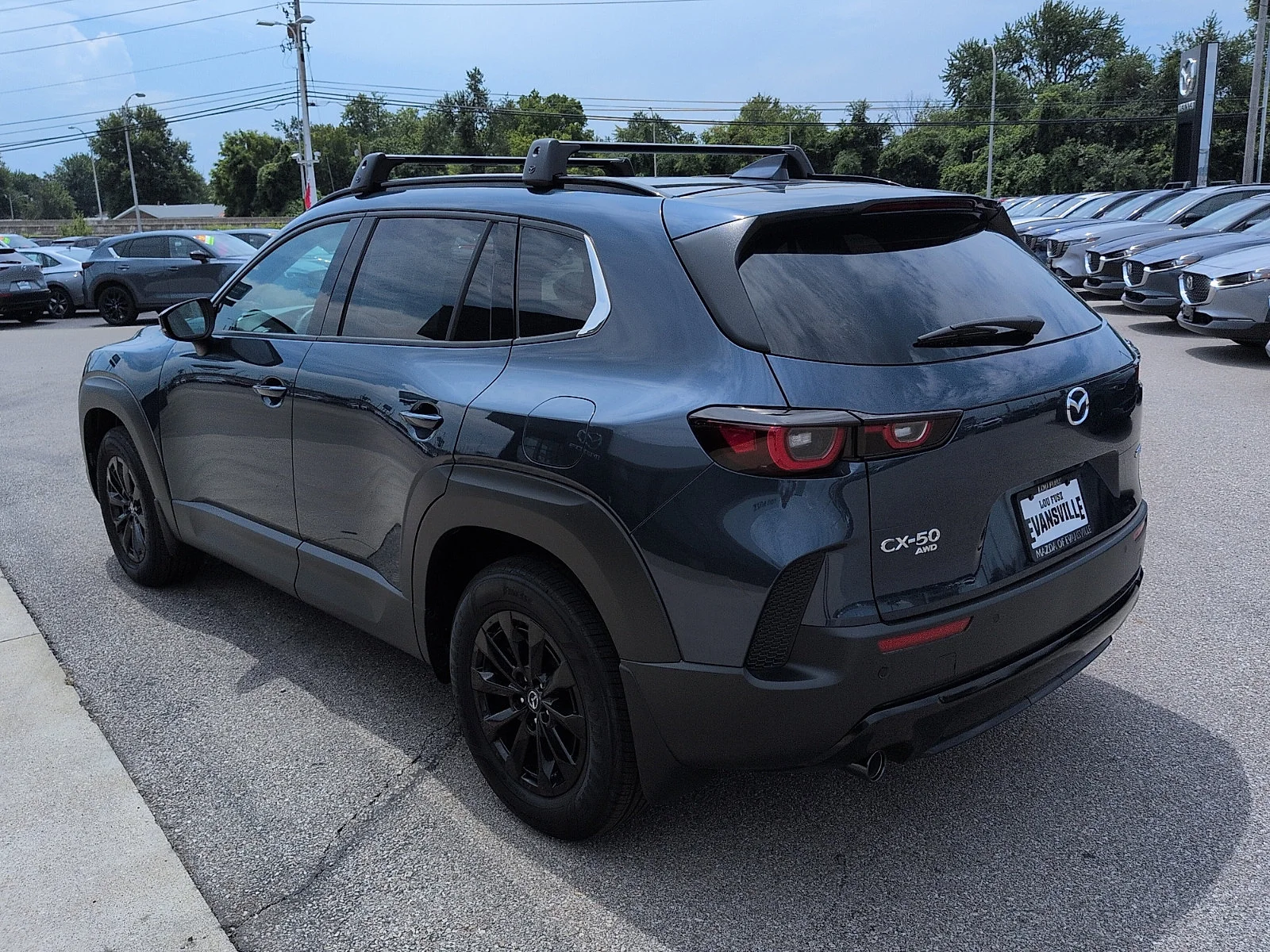 New 2026 Ingot Blue Metallic Mazda Premium image 5