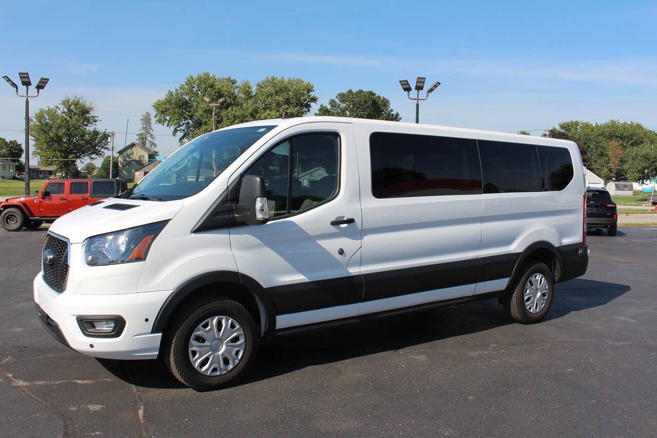 Used 2024 Oxford White Ford 350 XLT 3dr LWB Low Roof Passenger Van image 1