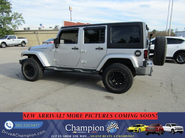Used 2012 Silver Jeep Unlimited Sahara image 6