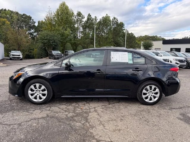 Used 2025 Midnight Black Metallic Toyota LE image 2