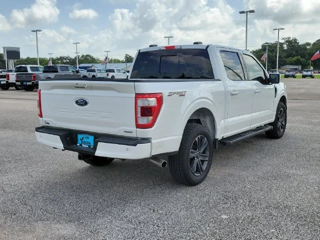 Used 2023 White Metallic Ford Lariat image 4