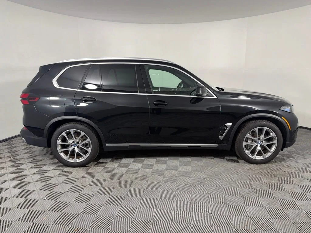 Certified Used 2024 Black Sapphire Metallic BMW xDrive50e image 4