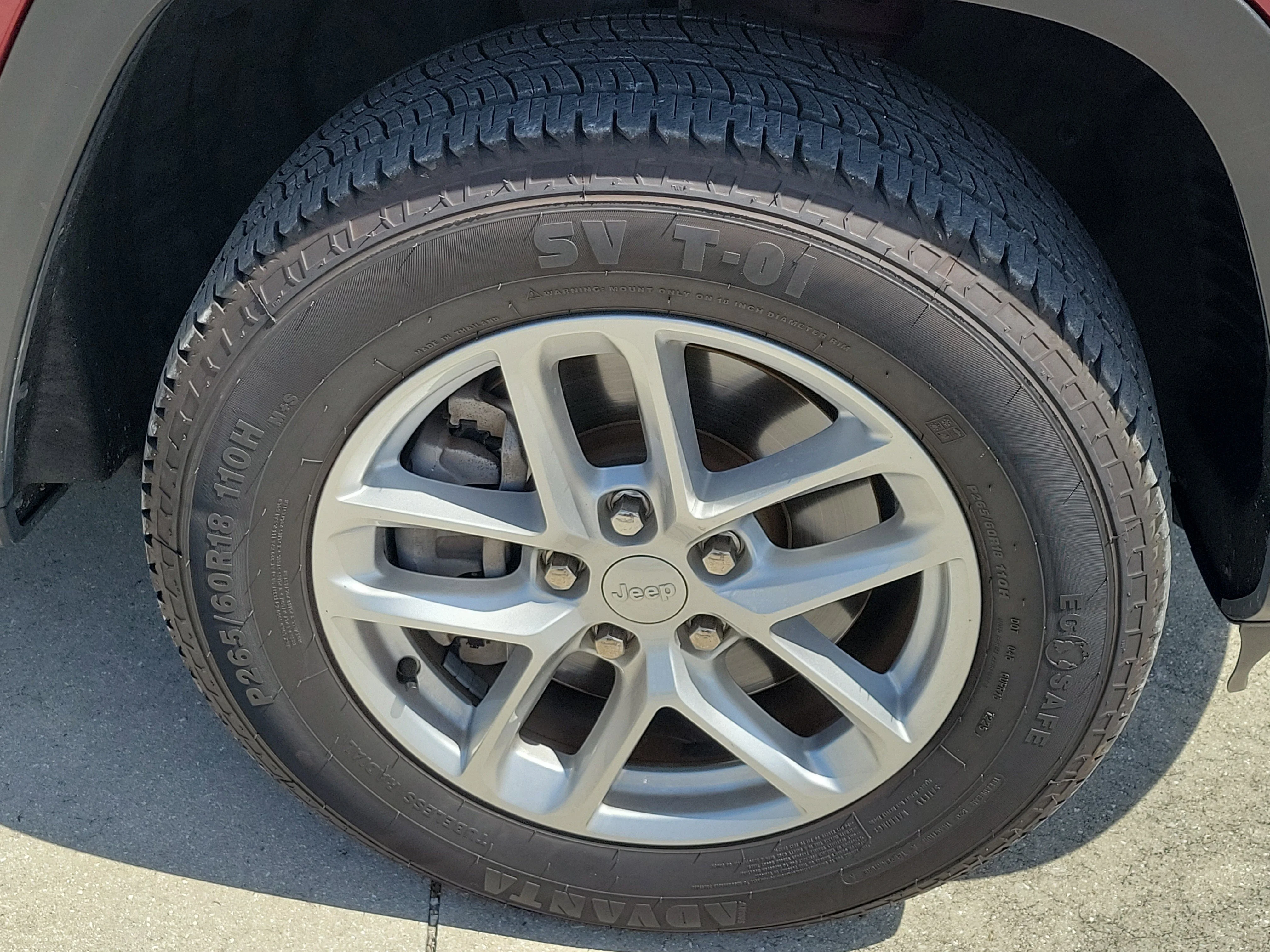 Used 2023 Velvet Red Pearlcoat Jeep Laredo image 8