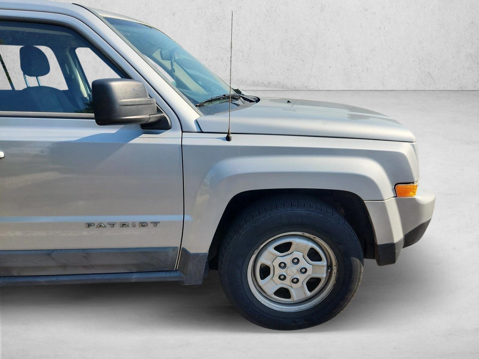 Used 2011 Bright Silver Metallic Jeep Sport image 5