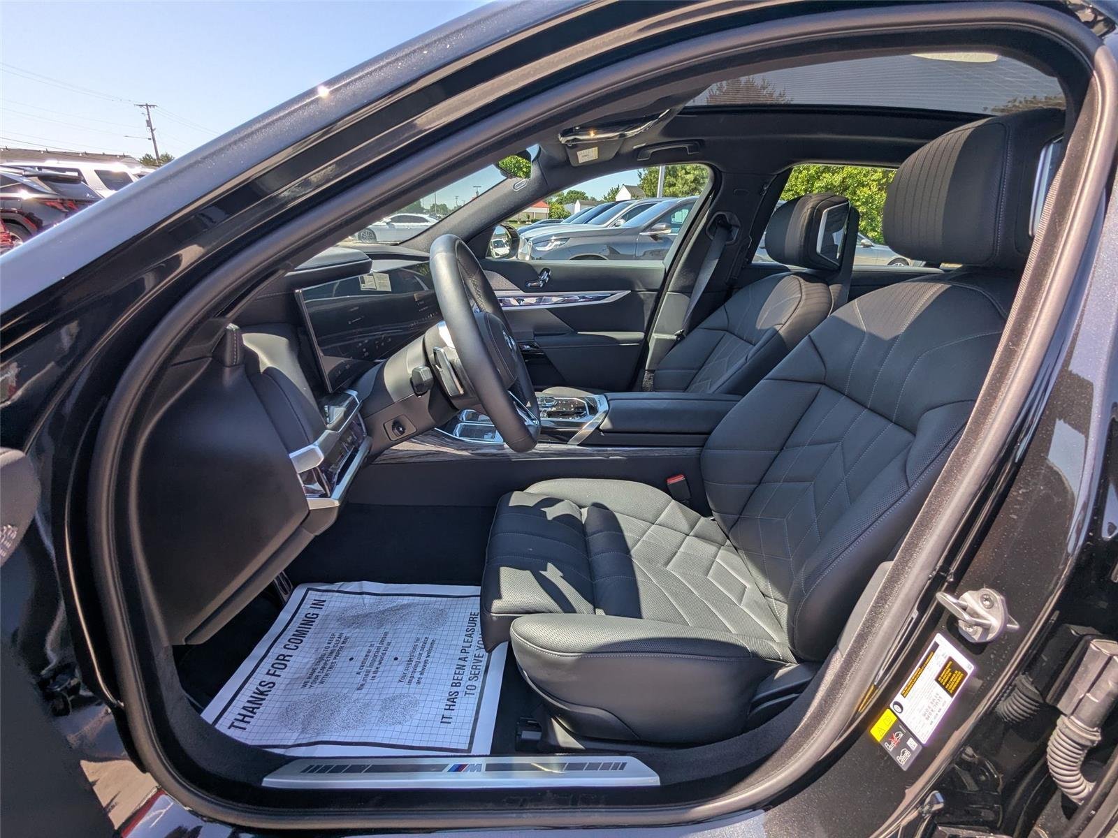 Used 2025 Black Sapphire Metallic BMW eDrive50 image 22