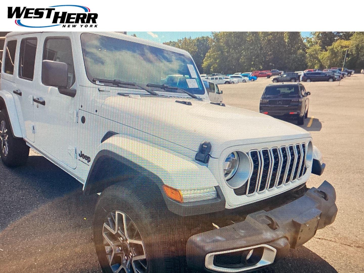 Used 2026 Bright White Clearcoat Jeep Sahara image 1