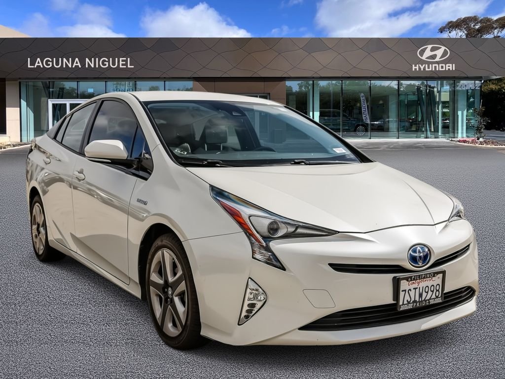Used 2016 White Toyota Three Touring image 1