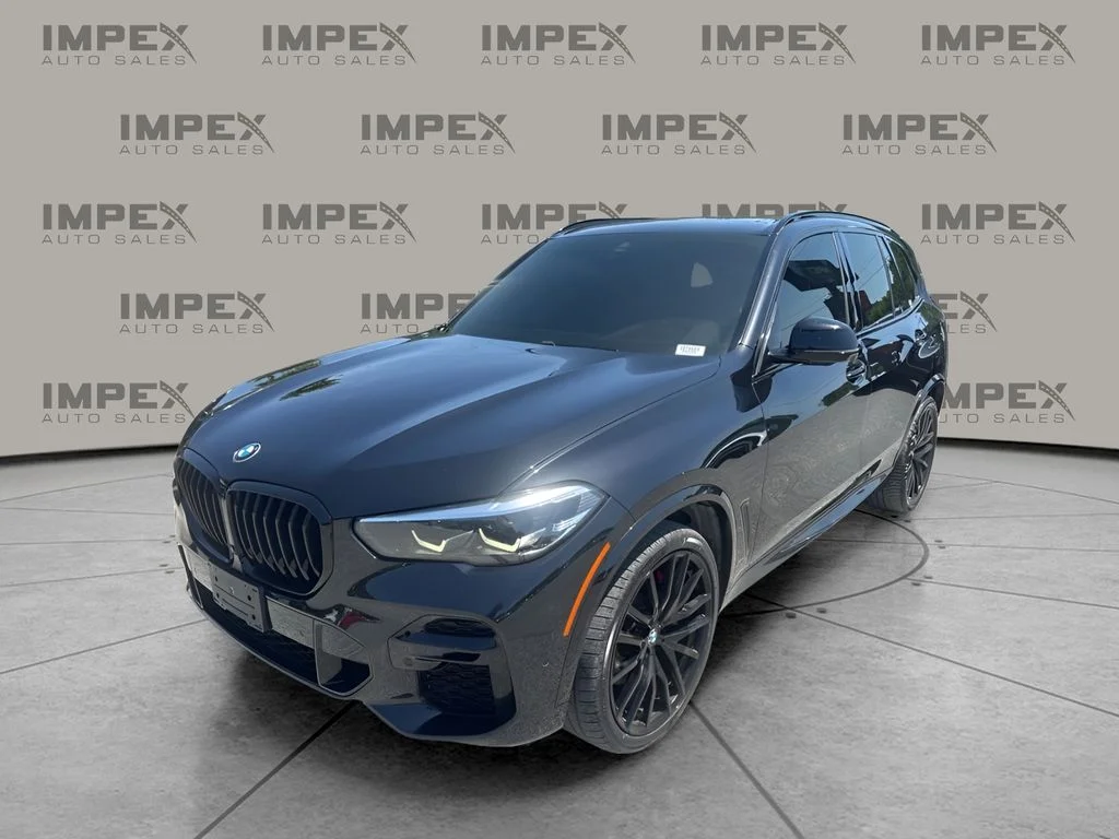 Used 2022 Black BMW xDrive40i image 1