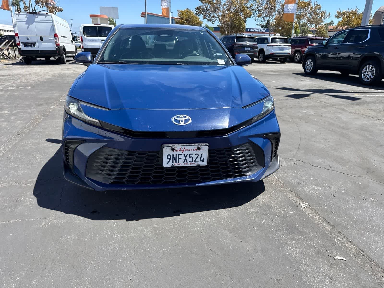 Used 2025 Reservoir Blue Toyota SE image 4