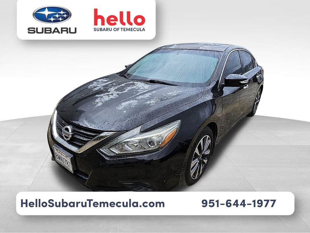 Used 2016 Black Nissan 2.5 SV image 1