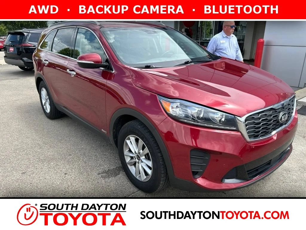 Used 2020 Passion Red Kia LX image 1