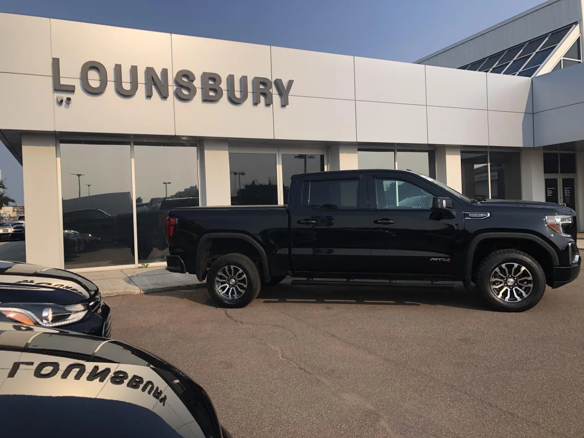 Used 2022 Black GMC 4WD Crew Cab 147" AT4 image 3