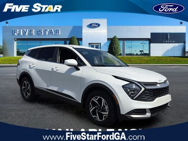 Used 2025 Snow White Pearl Kia LX image 1