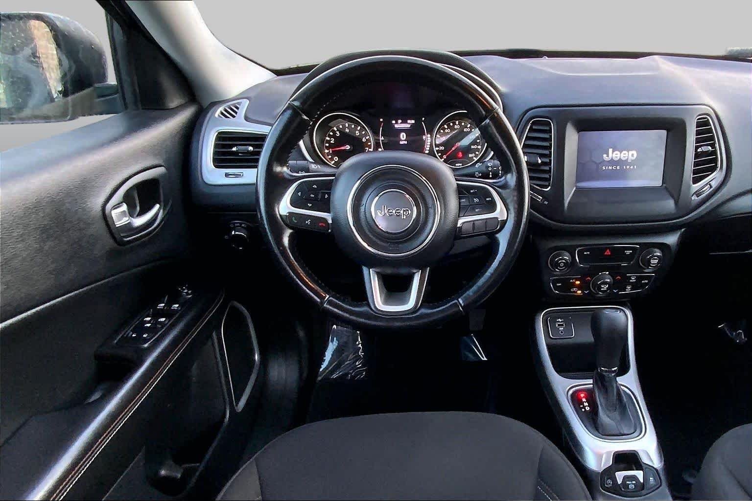 Used 2021 Granite Crystal Metallic Clearcoat Jeep Sport image 6