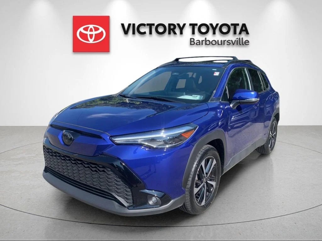 Used 2024 Blue Toyota Hybrid XSE image 1