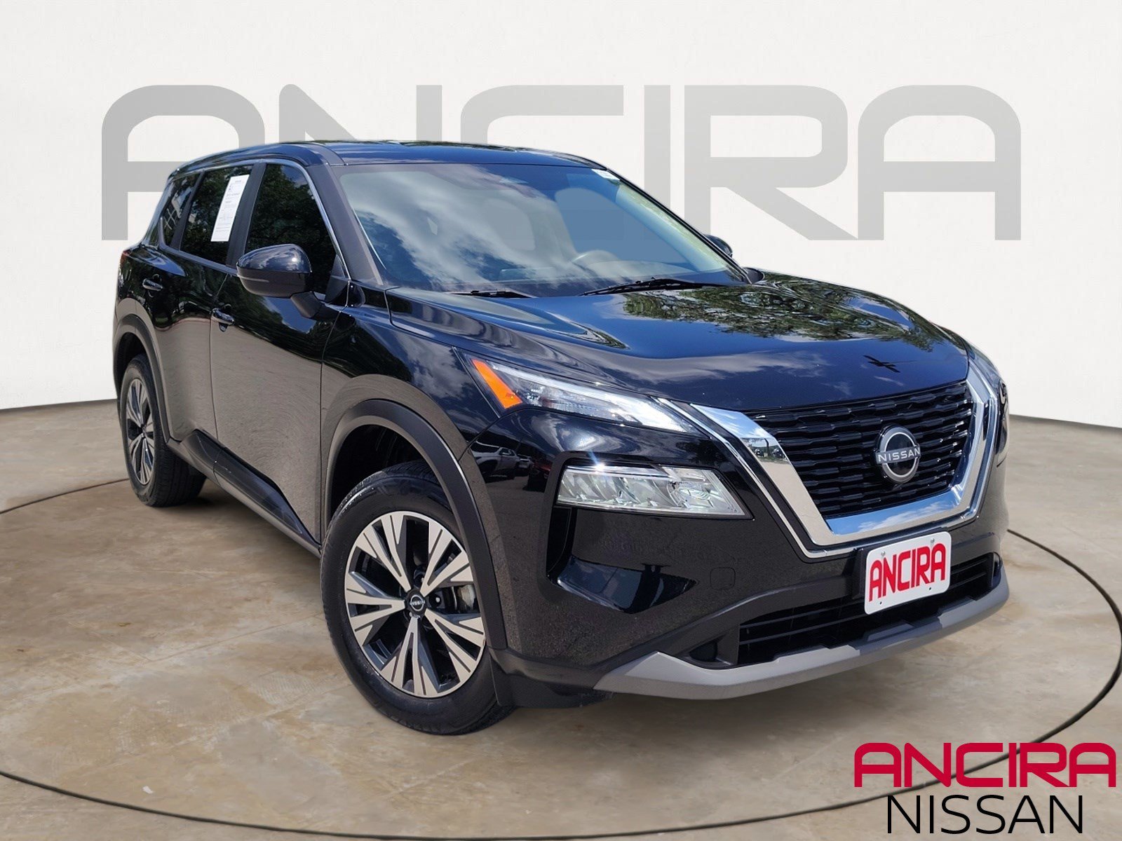 Used 2023 Super Black Nissan SV image 1