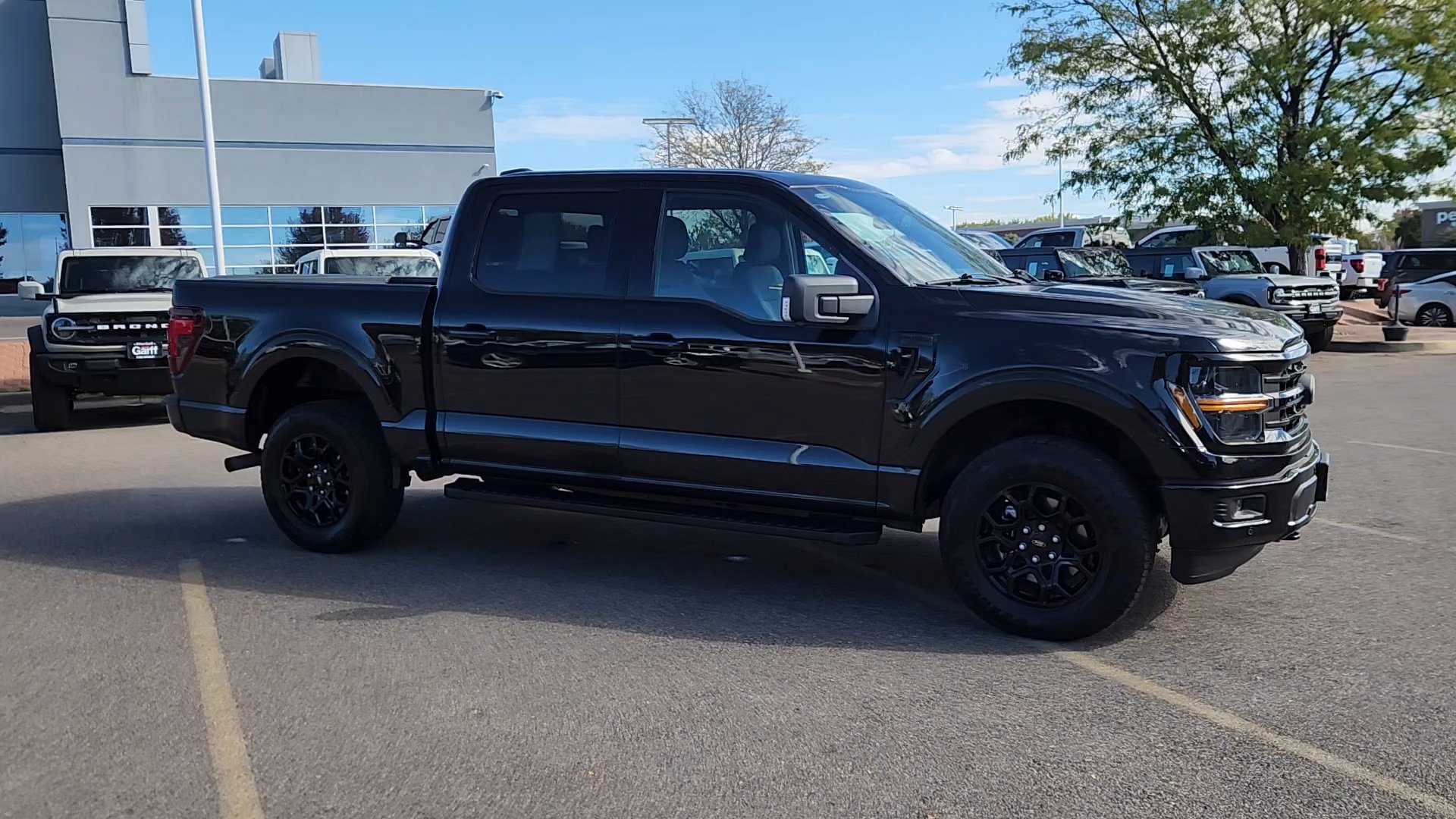Certified Used 2024 Agate Black Metallic Ford XLT image 8
