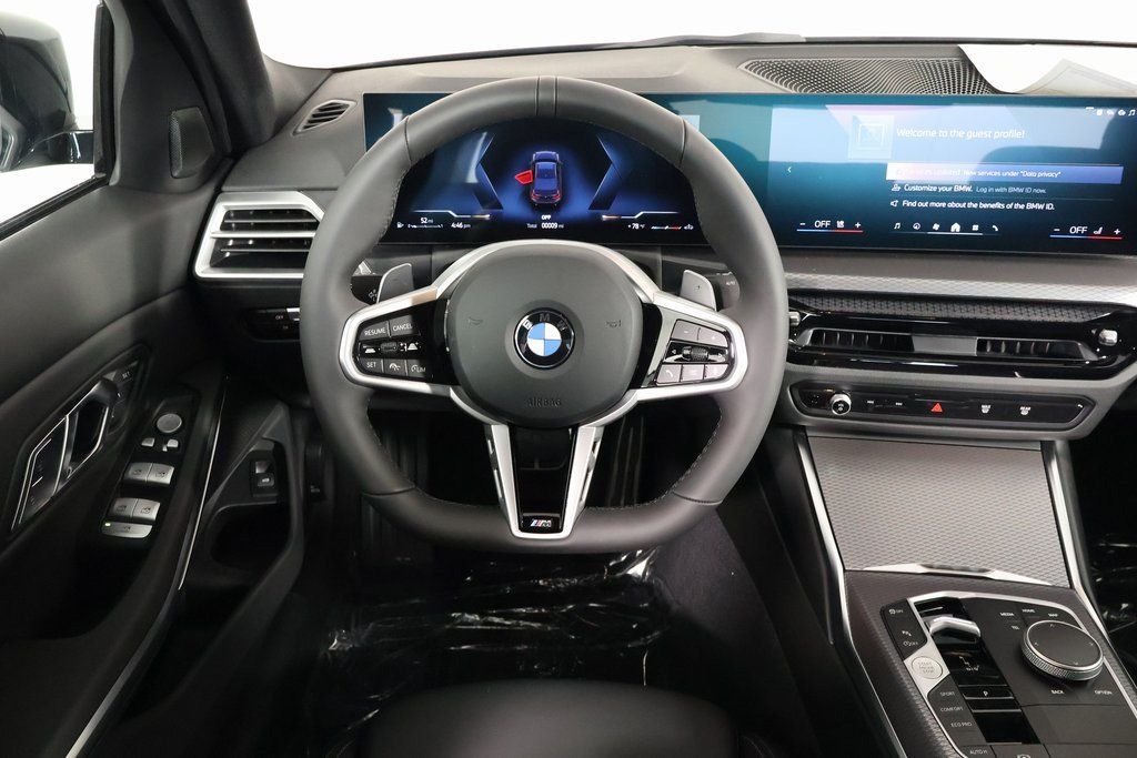 New 2026 Black Sapphire Metallic BMW 330i image 3