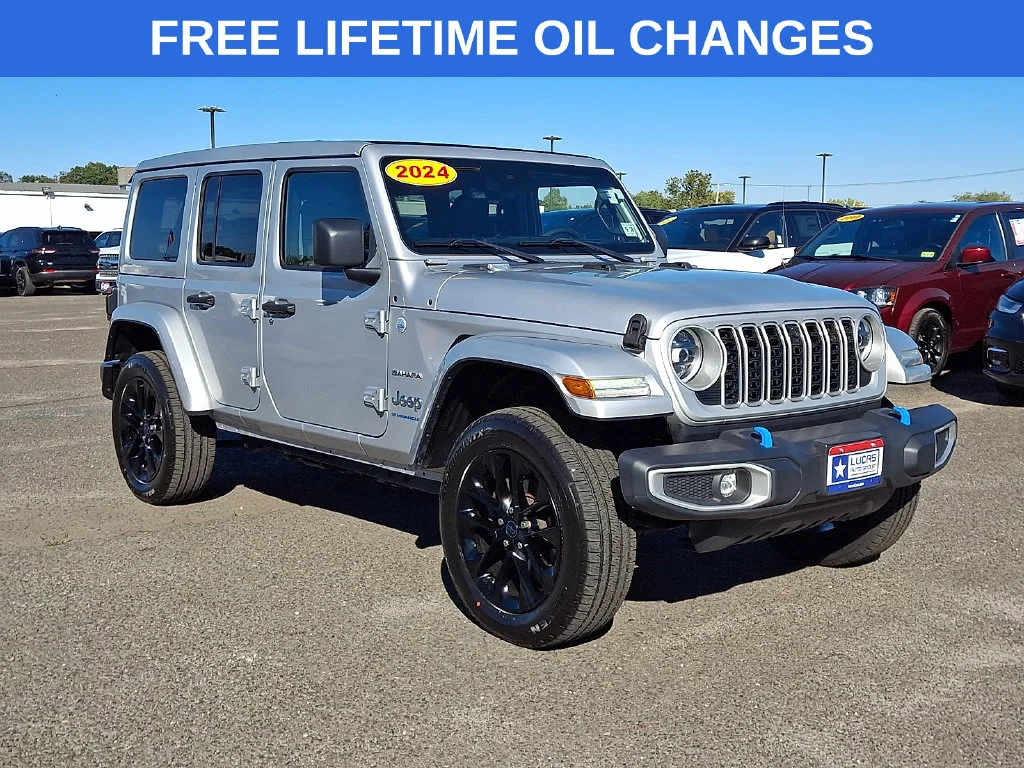 Used 2024 Silver Jeep Sahara 4xe image 1
