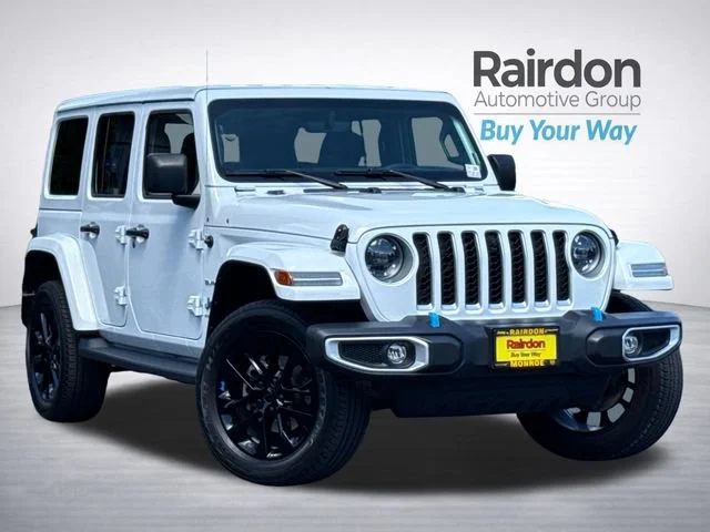 Used 2023 Bright White Clearcoat Jeep Sahara 4xe image 1