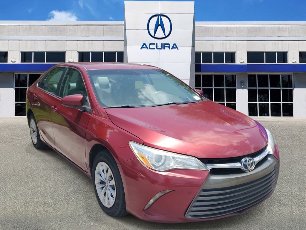 Used 2015 Red Toyota LE image 1