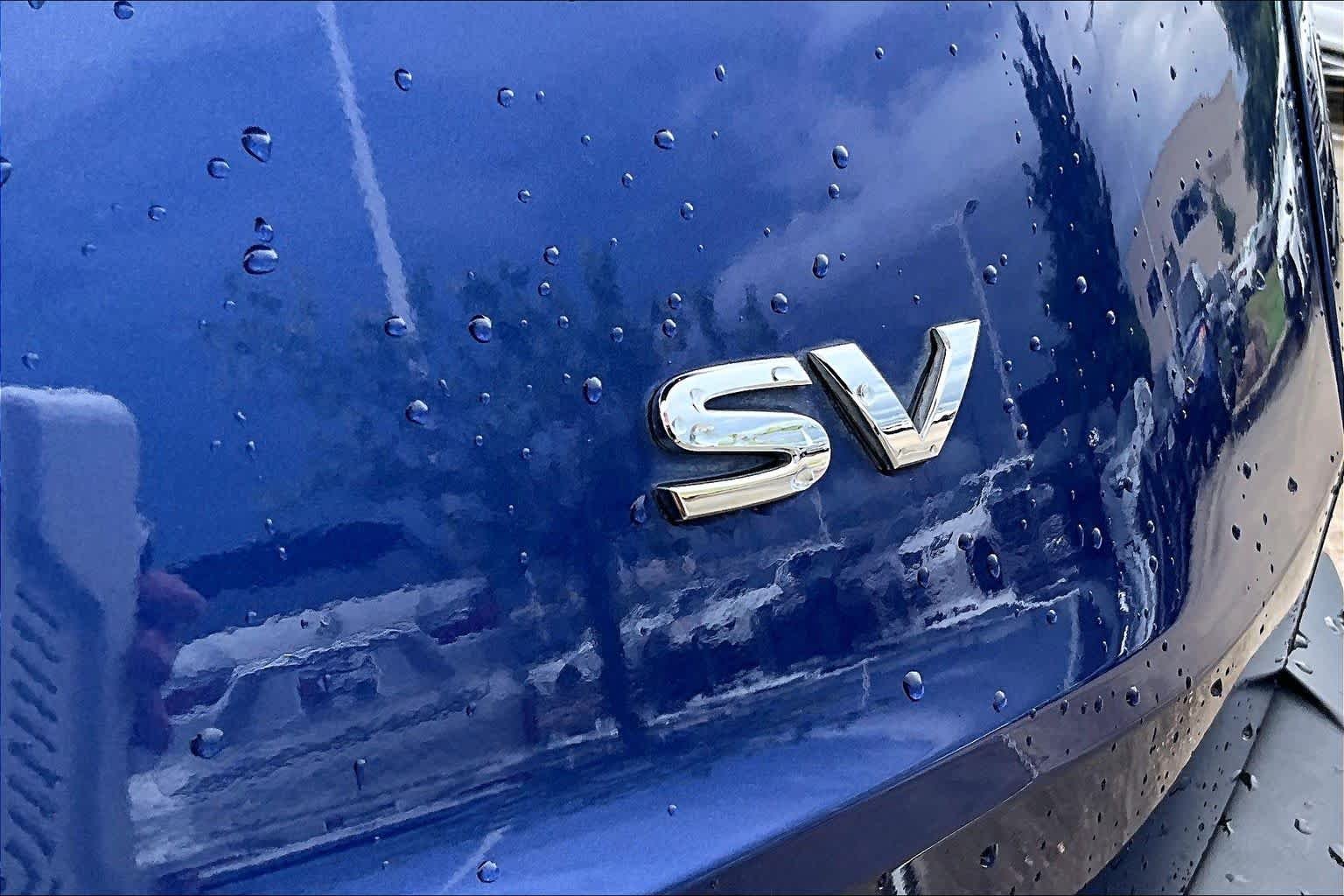 Used 2023 Caspian Blue Metallic Nissan SV image 9