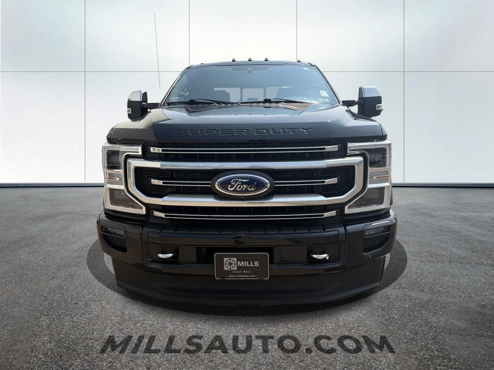 Used 2021 Black Metallic Ford Platinum image 2