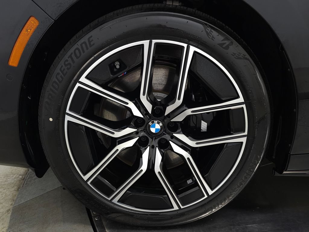 Used 2026 Black Sapphire Metallic BMW xDrive60 image 13