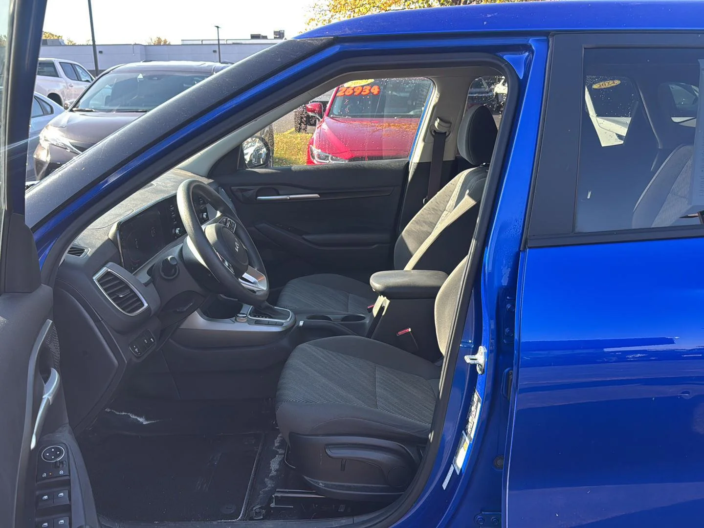 Used 2024 Neptune Blue Kia LX image 11