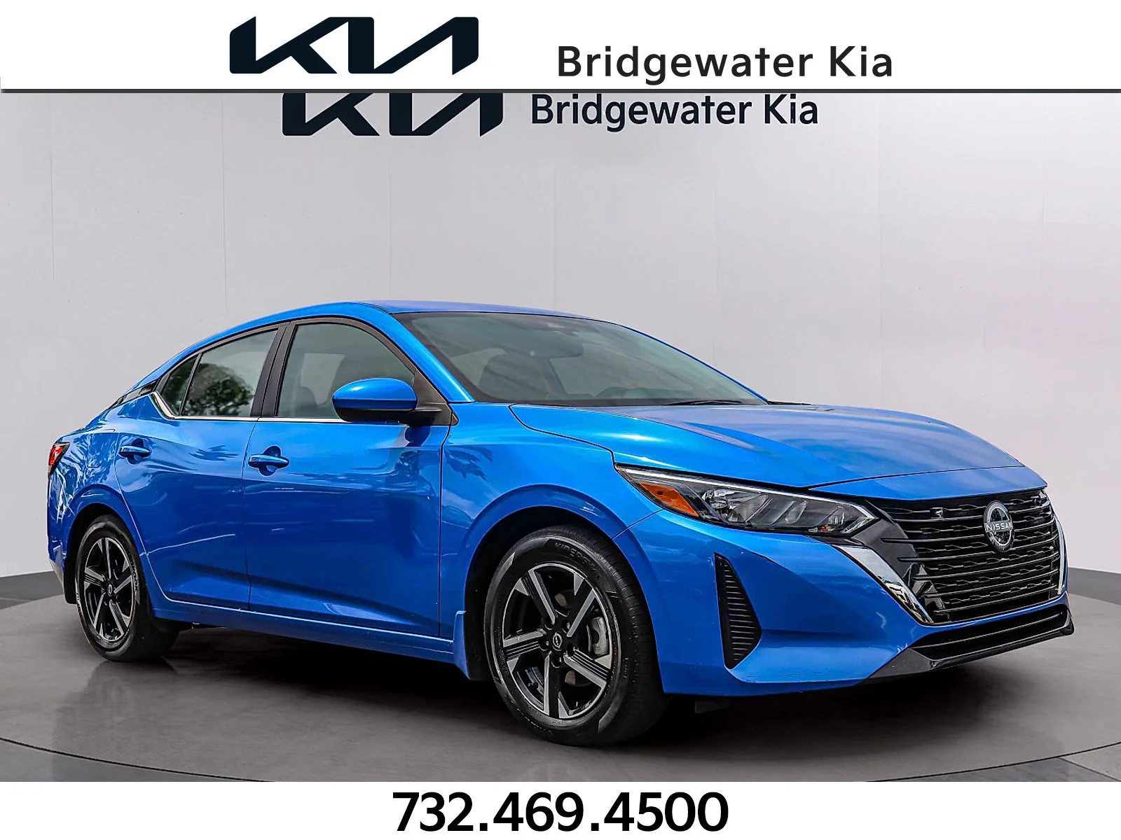 Used 2024 Electric Blue Metallic Nissan SV image 1