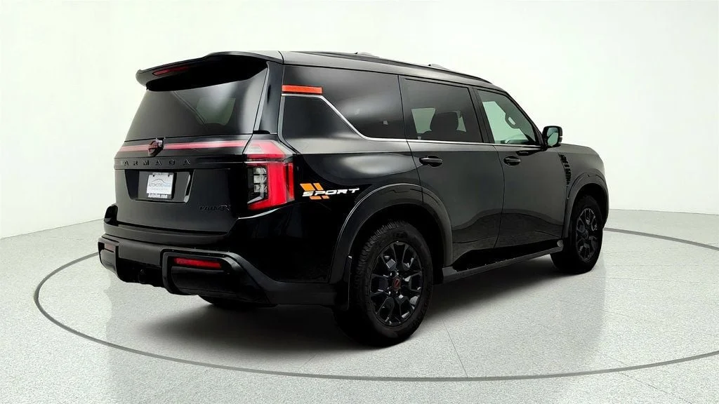 Used 2025 Super Black Nissan 4x4 PRO-4X w/ Cross Bars image 5