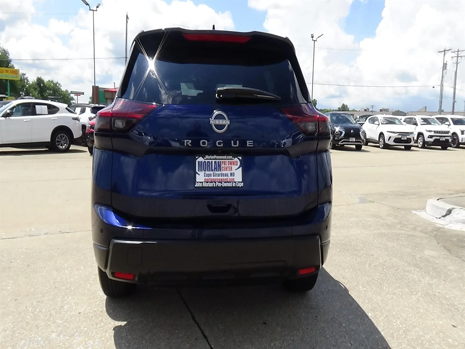 Used 2025 Deep Ocean Blue Pearl (rcj) Nissan SV image 6