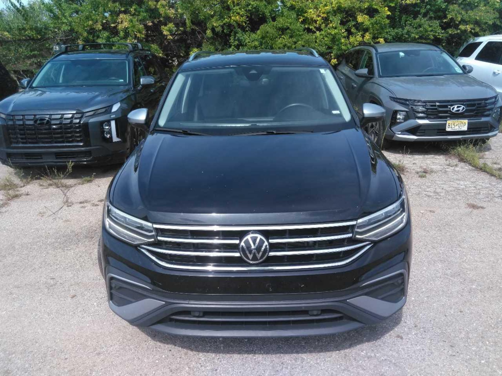 Used 2024 Deep Black Pearl Volkswagen Wolfsburg Edition image 2