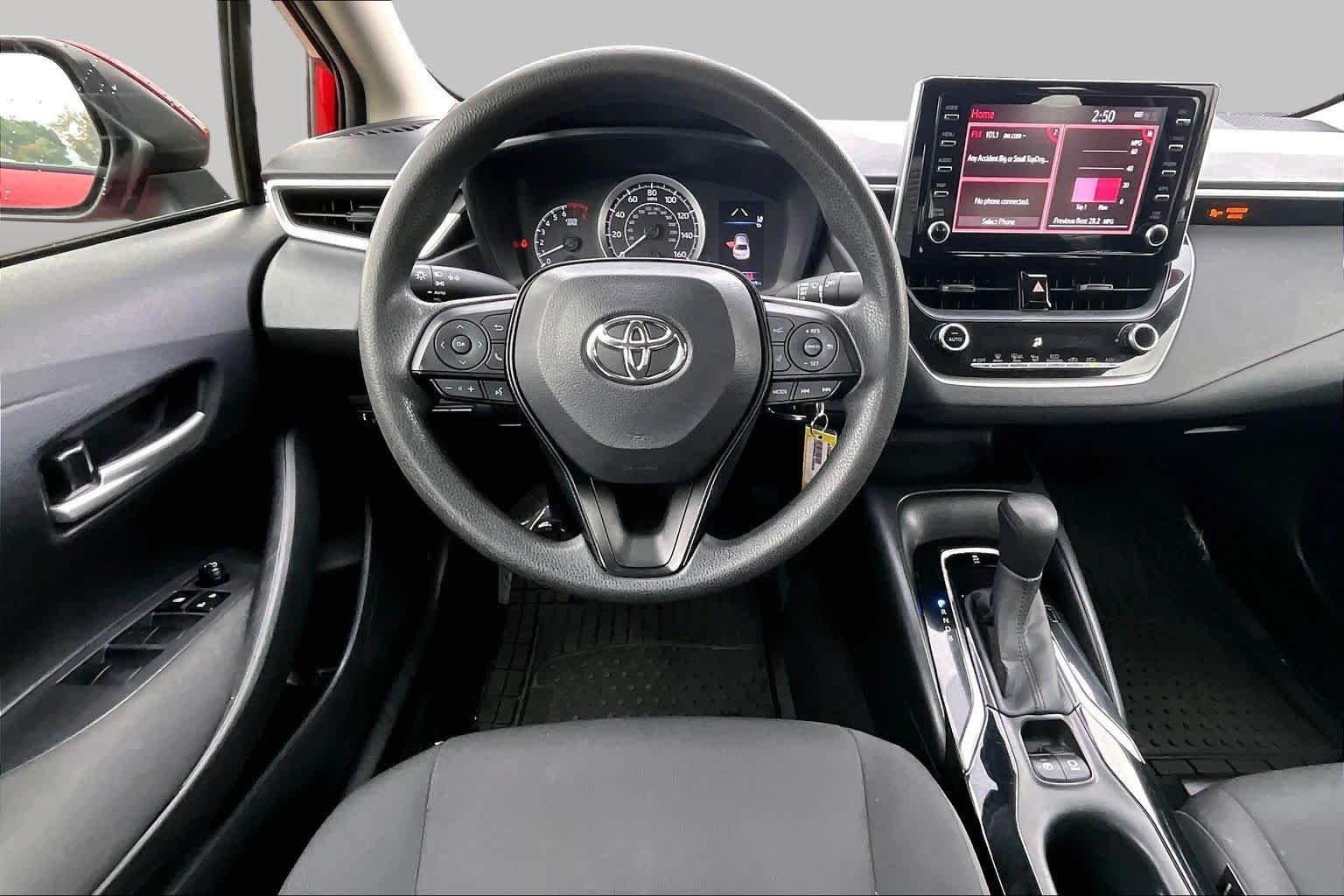 Used 2020 Barcelona Red Metallic Toyota LE image 5