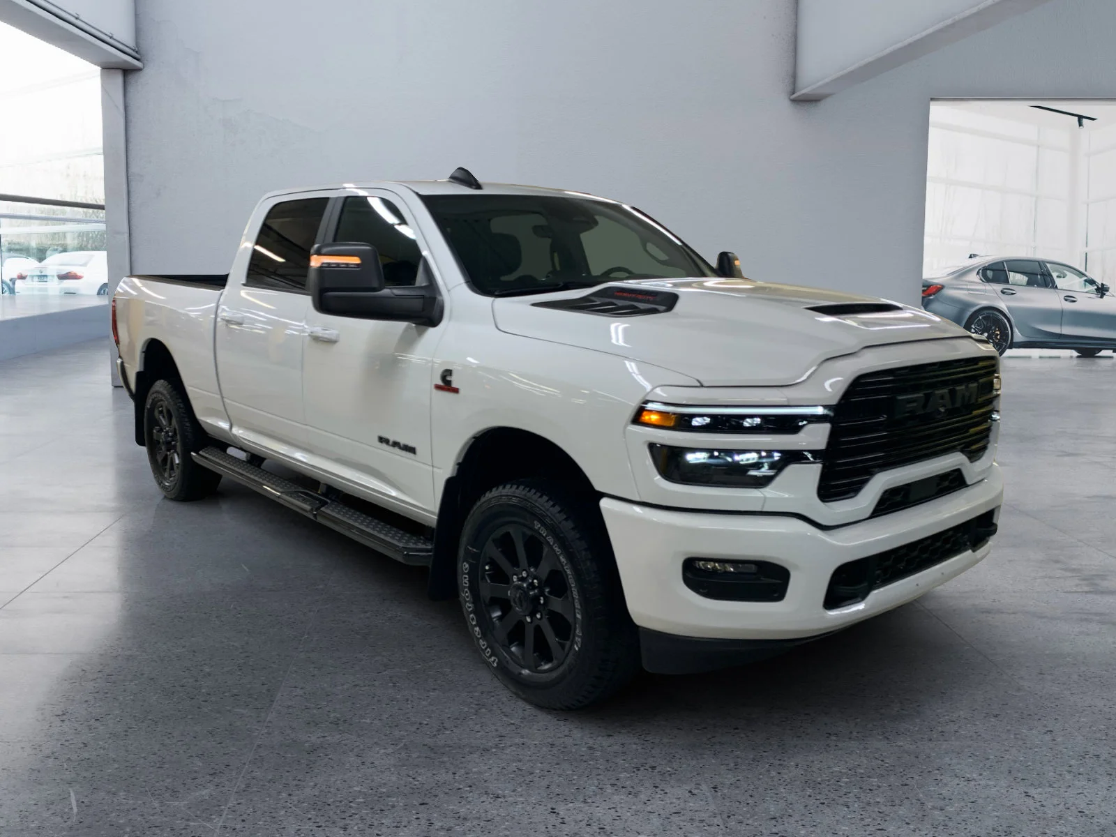 New 2026 Bright White Ram Laramie image 7