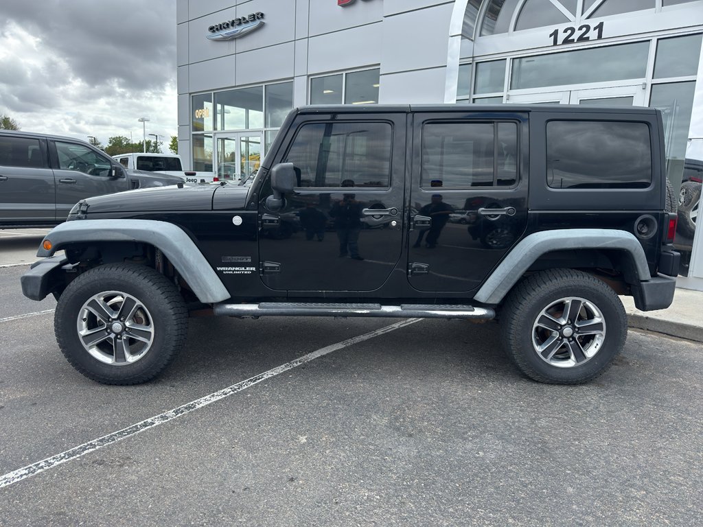 Used 2011 Black Clearcoat Jeep Sport image 2