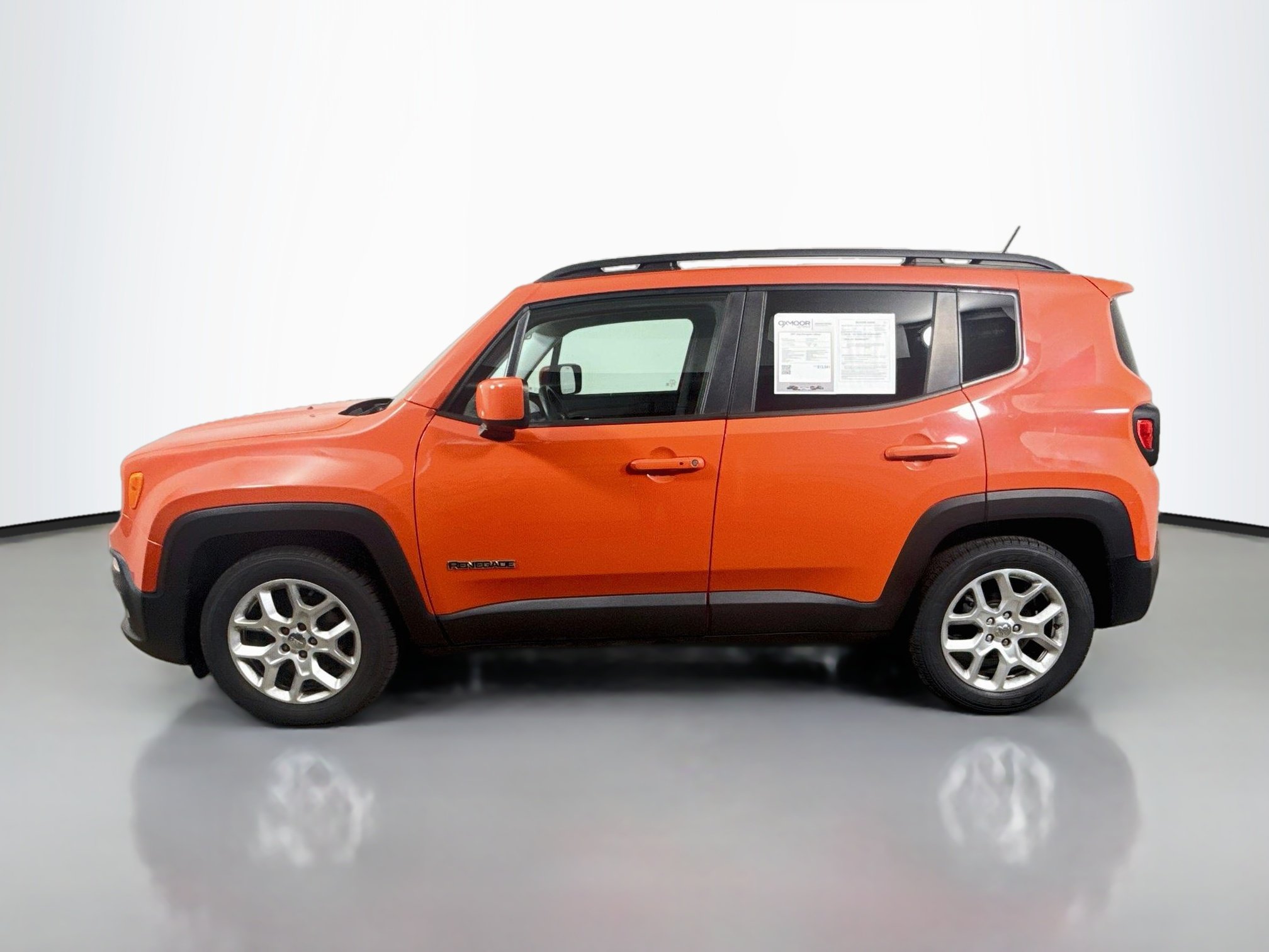 Used 2017 Omaha Orange Jeep Latitude image 4