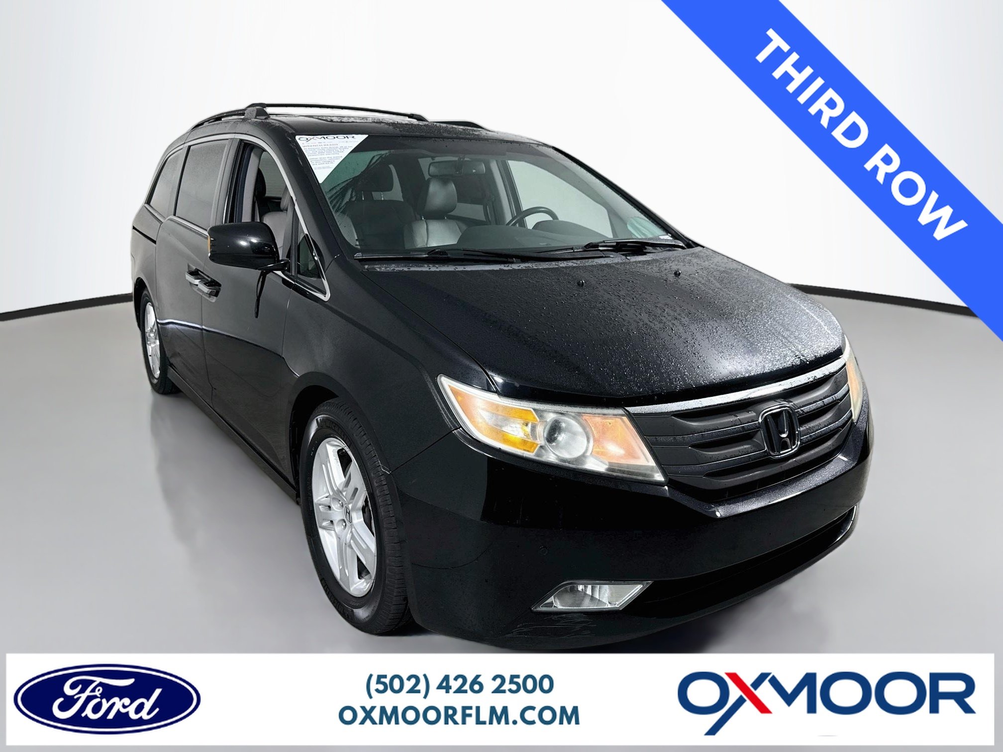 Used 2013 Crystal Black Pearl Honda Touring image 1