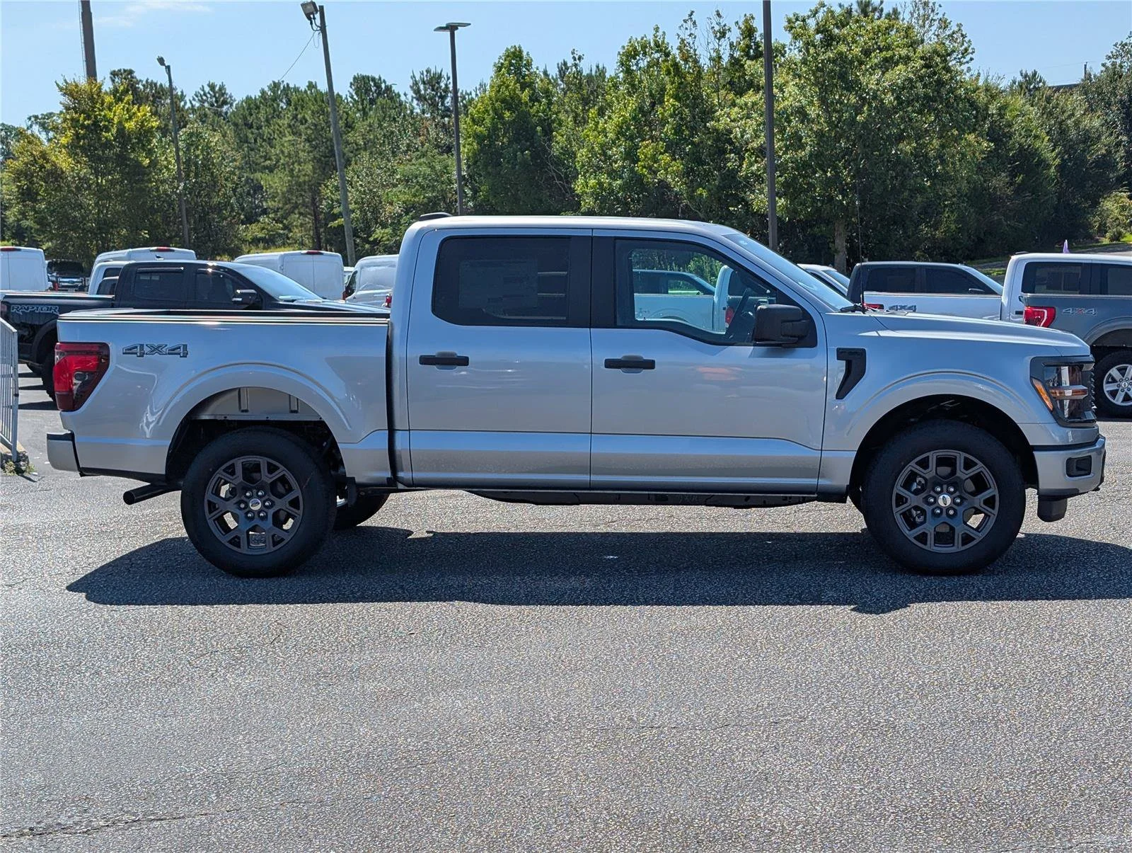 New 2026 Iconic Silver Metallic FORD STX 4WD SUPERCREW 5.5