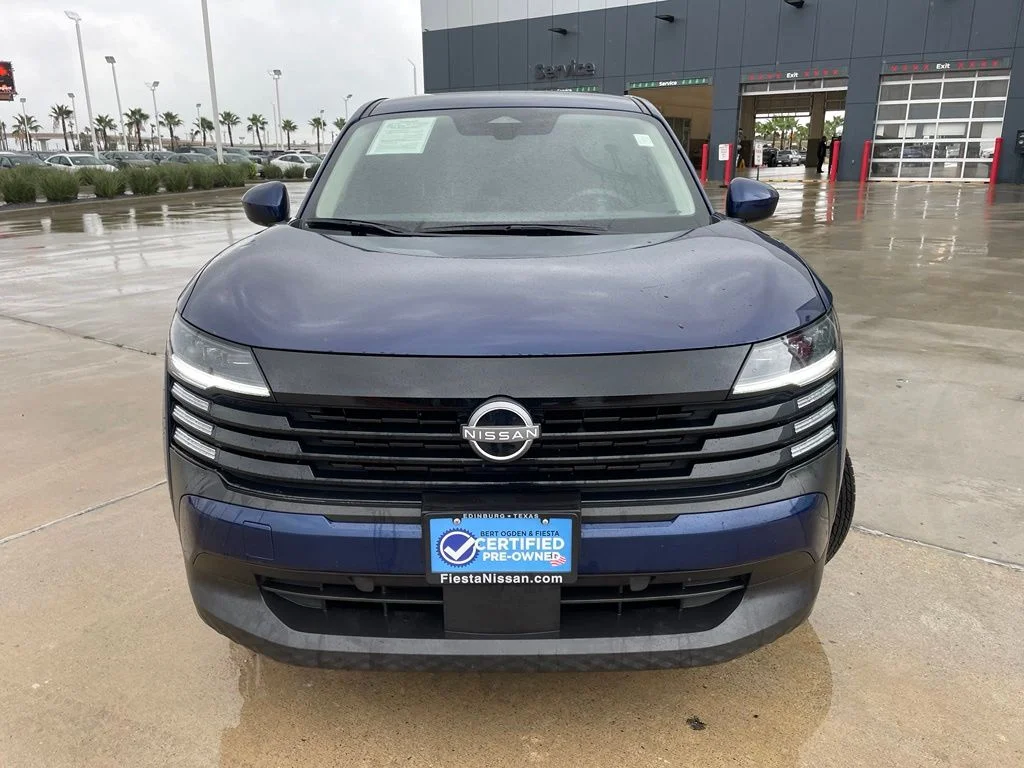 Certified Used 2025 Blue Nissan SV image 2