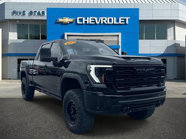 Used 2024 Black GMC AT4X image 1